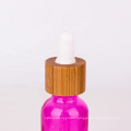 custom made color 30ml essential oil glass bottle with wood dropper lid